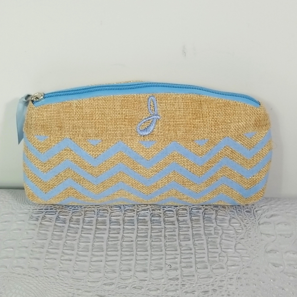 COSMETIC BAG WITH J INITIAL ON FRONT